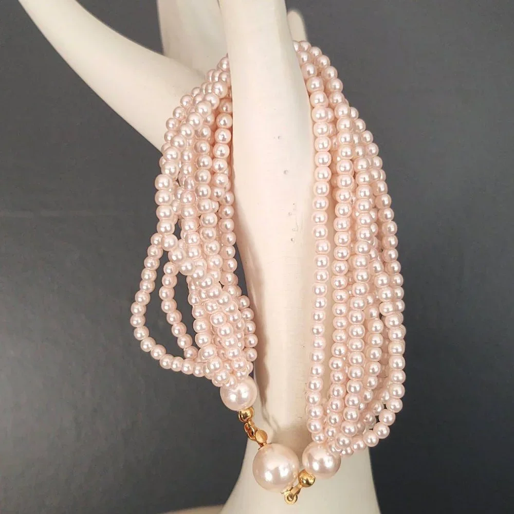 Vintage multi strand pink beaded necklace and bracelet set